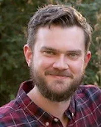Richard is a man around thirty years of age of European descent. He is sporting a trim bears, a cozy plaid flannel shirt, and a warm smile which tempts unsuspecting gamers into fictional moral and physical dilemmas of unusual size.