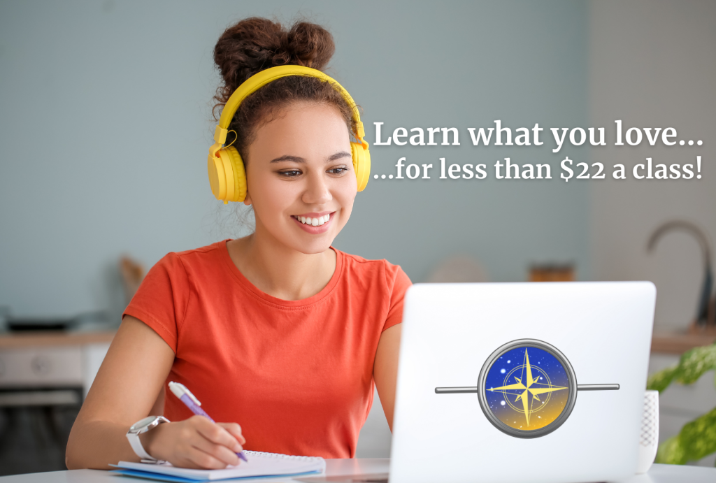 A woman of color sitting in front of her laptop with a Signum SPACE logo sticker on the back, smiling and learning.